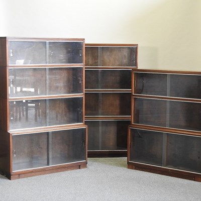 Lot 625 - A mid 20th century Minty glazed sectional bookcase