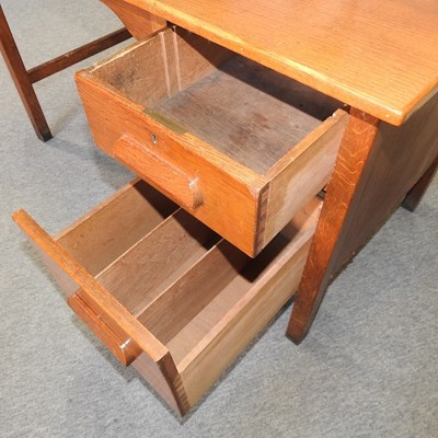 Lot 487 - A mid 20th century single pedestal desk