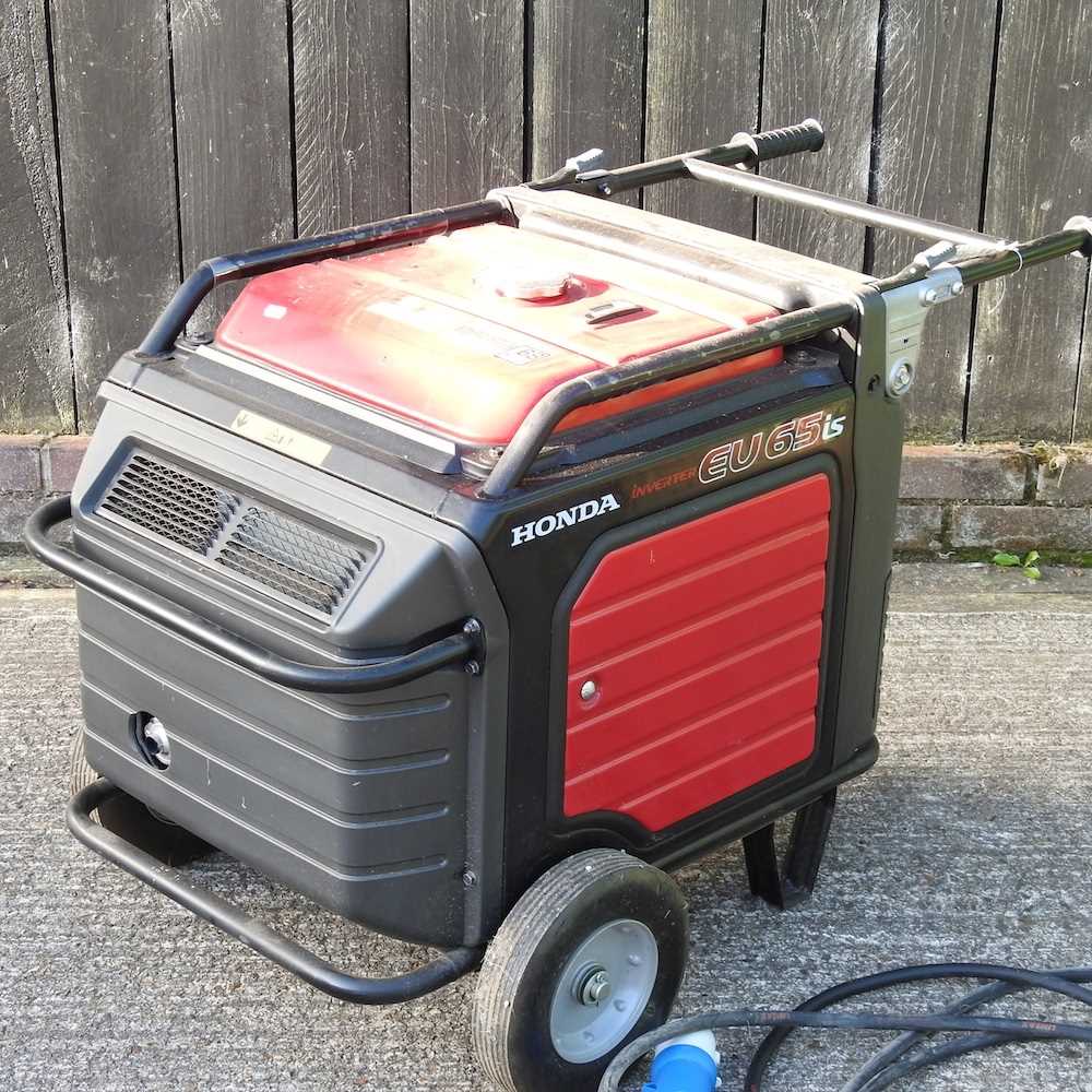 Lot 325 - A Honda EU65IS petrol generator