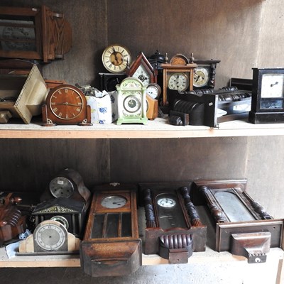 Lot 233 - A large collection of clock parts