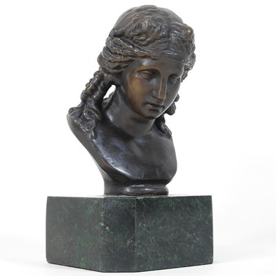 Lot 227 - A bronze portrait bust of a girl