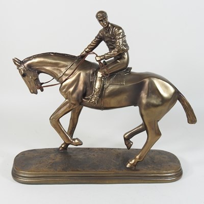 Lot 216 - A model of a horse and jockey