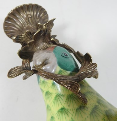 Lot 97 - A pair of reproduction parrot wall sconces