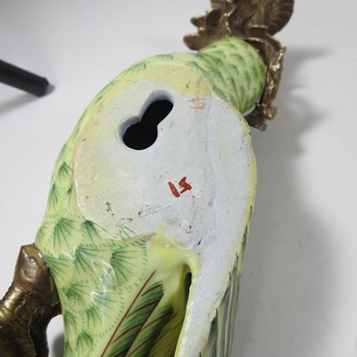 Lot 97 - A pair of reproduction parrot wall sconces