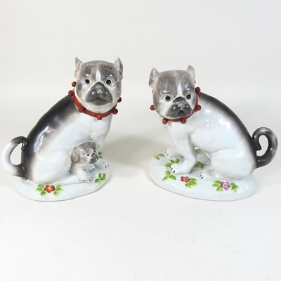 Lot 136 - A pair of porcelain models of pug dogs