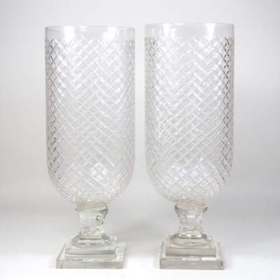 Lot 239 - A pair of cut glass storm lamps