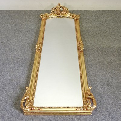 Lot 801 - A modern ornate gilt framed pier mirror