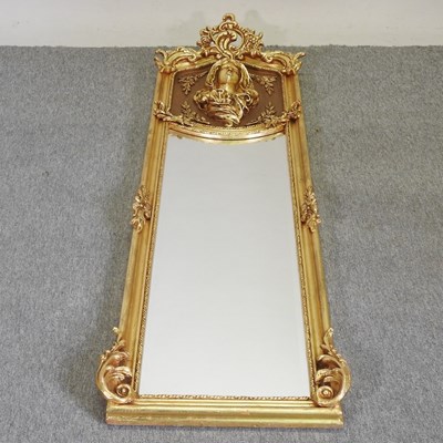 Lot 193 - An Art Nouveau style gilt framed wall mirror