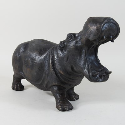 Lot 244 - A bronzed metal model of a hippo