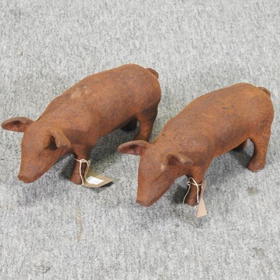 Lot 50 - A pair of small rusted iron models of pigs