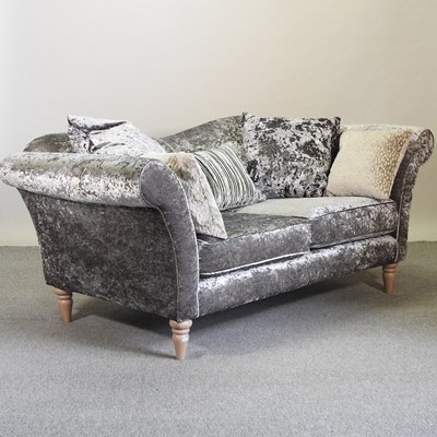 Lot 642 - A grey crushed velvet upholstered sofa