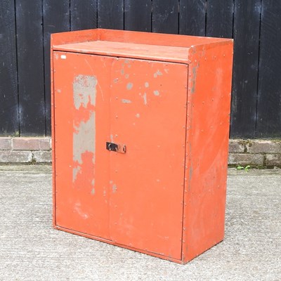 Lot 369 - A red painted metal cabinet