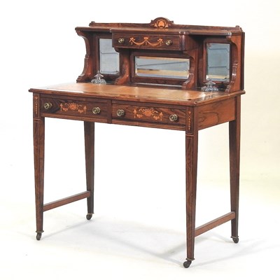 Lot 197 - An Edwardian rosewood and inlaid writing table