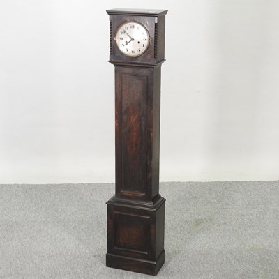 Lot 455 - A 1930's oak cased granddaughter clock