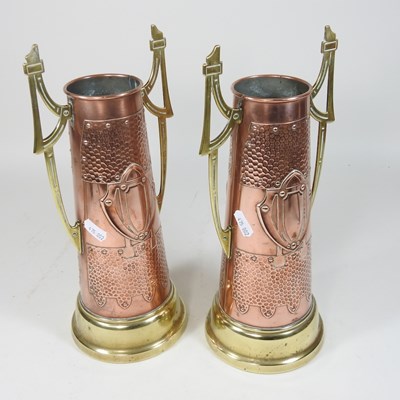 Lot 48 - A pair of Arts and Crafts brass and copper vases