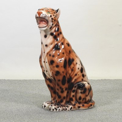 Lot 113 - A large painted plaster model of a seated cheetah