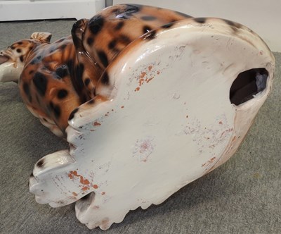 Lot 113 - A large painted plaster model of a seated cheetah