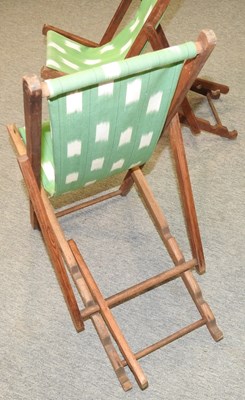 Lot 385 - A pair of child's folding deck chairs