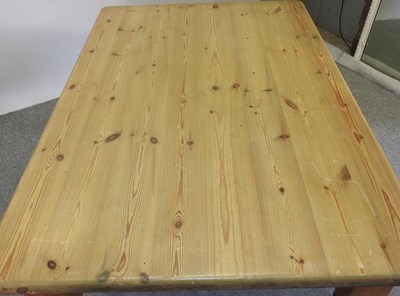Lot 408 - A pine dining table