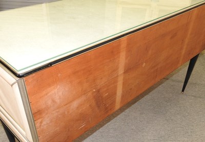Lot 653 - A 1950's Italian cream padded vinyl sideboard