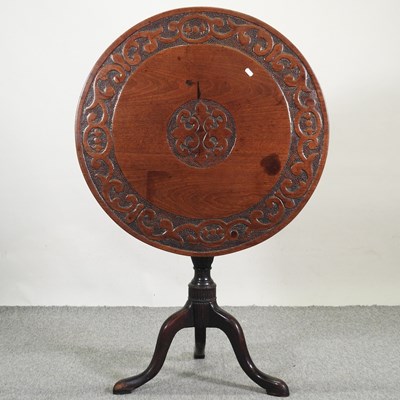 Lot 509 - A 19th century carved oak occasional table