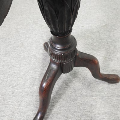 Lot 509 - A 19th century carved oak occasional table