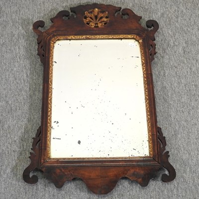 Lot 513 - A George III walnut and parcel gilt wall mirror
