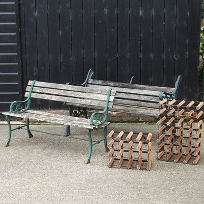 Lot 314 - A cast and wrought iron garden bench