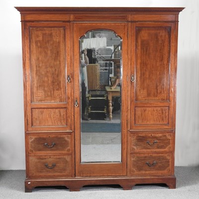 Lot 662 - A late Victorian mahogany and inlaid combination wardrobe