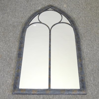 Lot 74 - An arched garden mirror