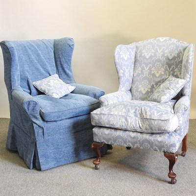 Lot 783 - An early 20th century blue upholstered wing armchair