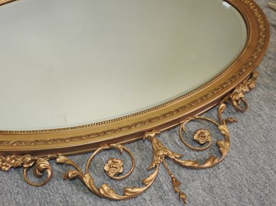 Lot 184 - A gilt framed oval wall mirror