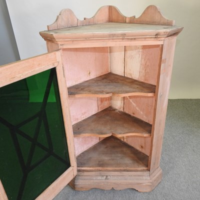 Lot 413 - A pine astragal glazed hanging corner cabinet