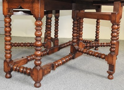 Lot 525 - An 18th century style oak wakes table