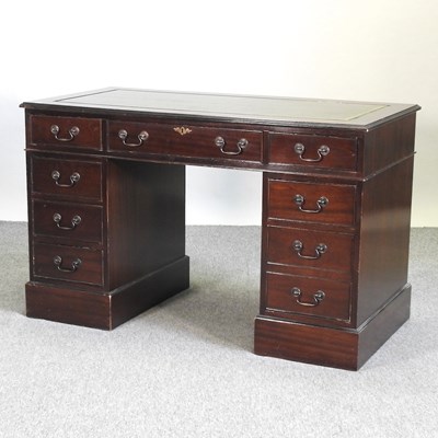 Lot 814 - A reproduction mahogany pedestal desk