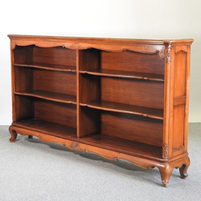 Lot 527 - A 20th century continental fruitwood dwarf open bookcase