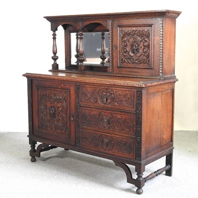 Lot 529 - An early 20th century carved oak sideboard