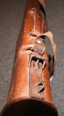 Lot 107 - An early 20th century brown leather gun case