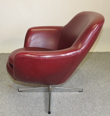 Lot 664 - A  1970's Danish red leather upholstered revolving armchair