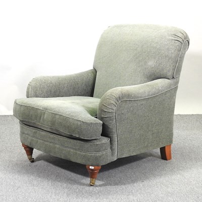 Lot 545 - A Howard style upholstered armchair