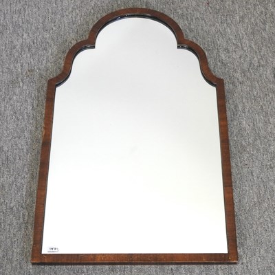Lot 548 - A Queen Anne style walnut framed wall mirror