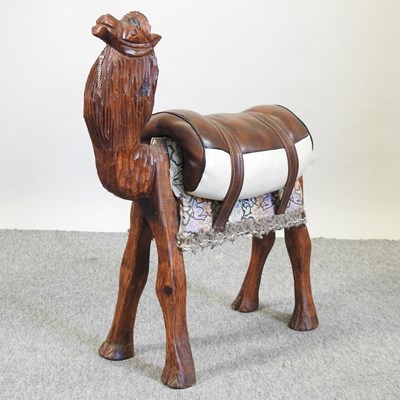Lot 559 - A camel stool