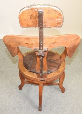 Lot 561 - A Victorian light oak barber's chair