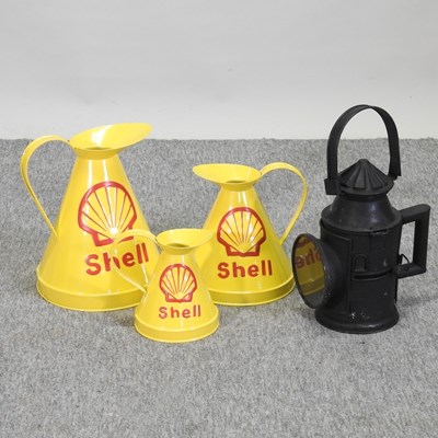 Lot 68 - A set of three Shell advertising jugs, together with a vintage style railway lamp