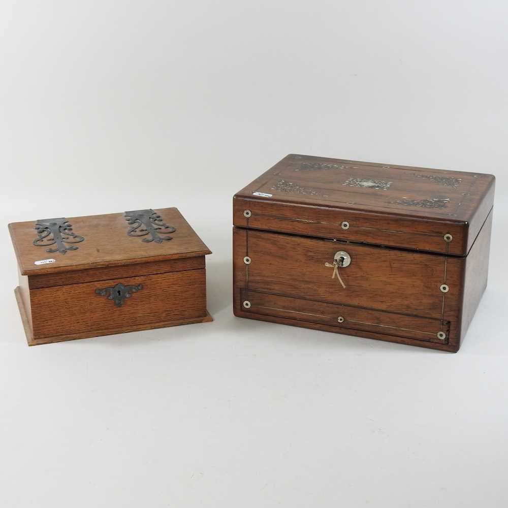Lot 35 - A Victorian rosewood and mother of pearl inlaid vanity case