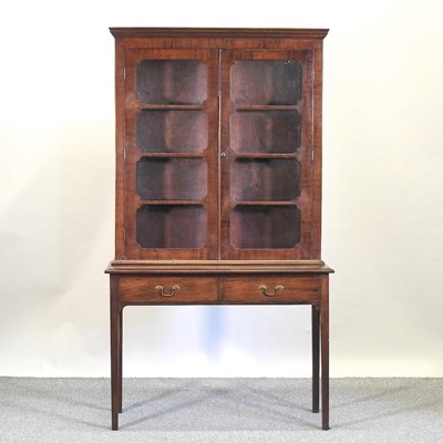Lot 573 - A late 19th century mahogany display cabinet