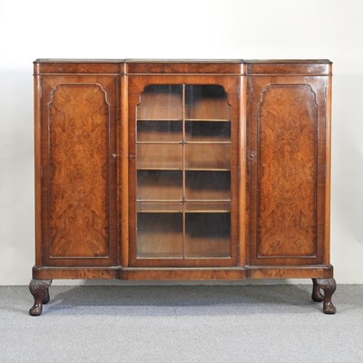 Lot 580 - A 1920's walnut dwarf bookcase