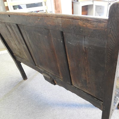 Lot 581 - An 18th century and later oak settle
