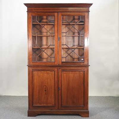 Lot 747 - A 19th century mahogany cabinet bookcase