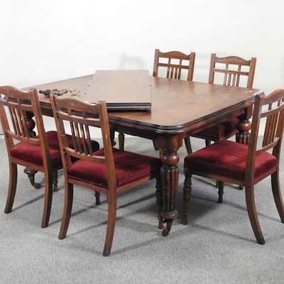 Lot 420 - A Victorian mahogany wind-out extending dining table